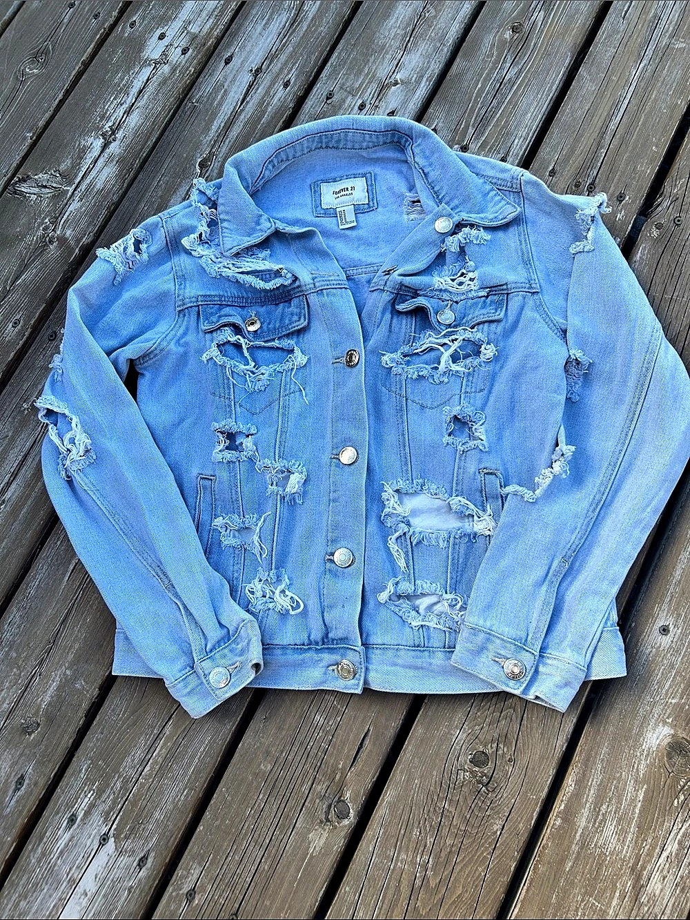 Forever 21 Distressed Light Wash Denim Jacket Distressed Denim Jacket in Blue